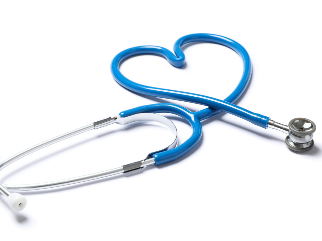 Stethoscope curled up against a white background