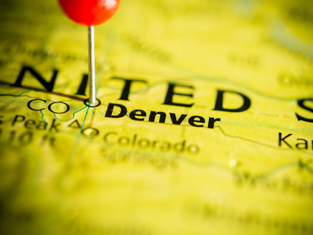 US map with a pin placed over Denver CO