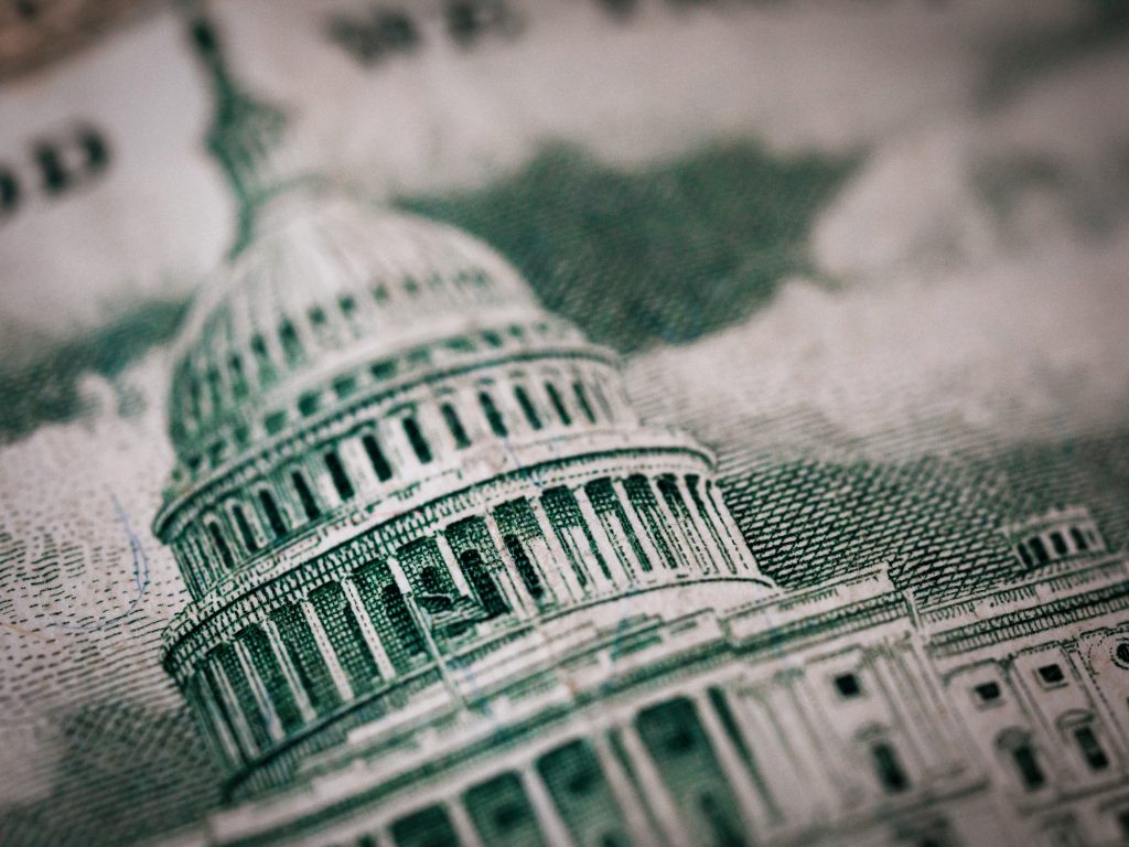 Macro image of the US capitol as shown on the back of dollar bill